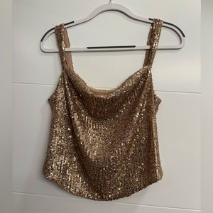 Sparkly gold tank top with slouched neckline